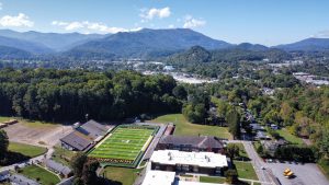 aerial view of wms with mountains in the background