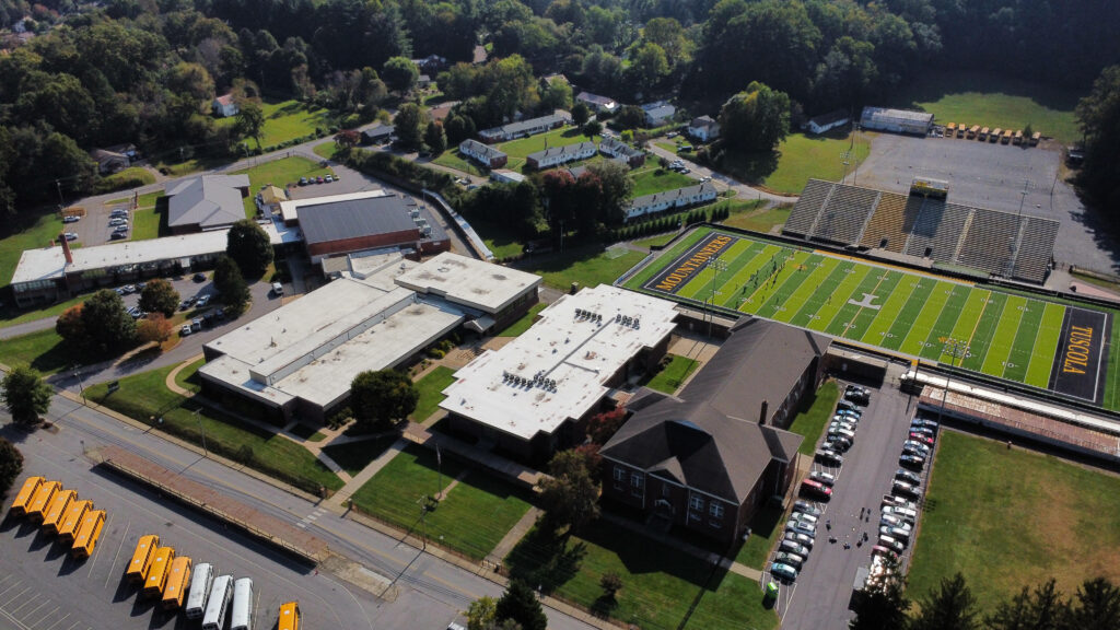 Ariel image of Waynesville Middle School, parking lots, and the football field